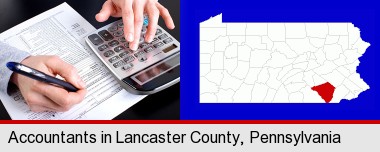 an accountant at work; Lancaster County highlighted in red on a map