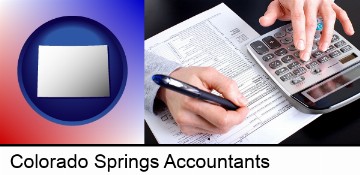 an accountant at work in Colorado Springs, CO