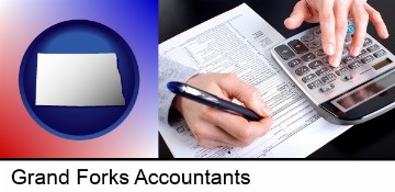 an accountant at work in Grand Forks, ND