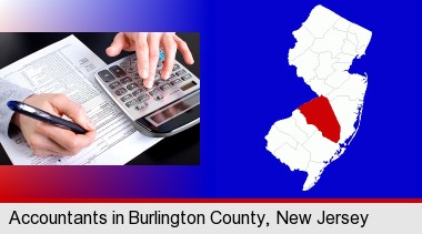 an accountant at work; Burlington County highlighted in red on a map