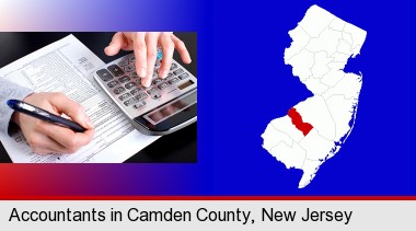 an accountant at work; Camden County highlighted in red on a map
