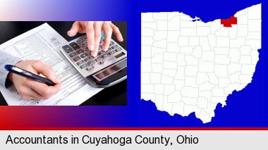 an accountant at work; Cuyahoga County highlighted in red on a map