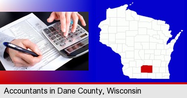 an accountant at work; Dane County highlighted in red on a map