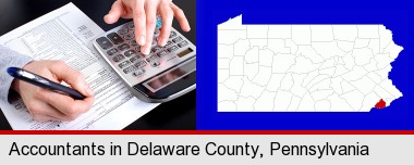 an accountant at work; Delaware County highlighted in red on a map