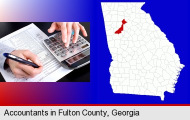 an accountant at work; Fulton County highlighted in red on a map