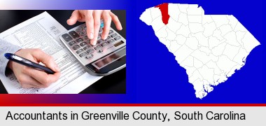 an accountant at work; Greenville County highlighted in red on a map