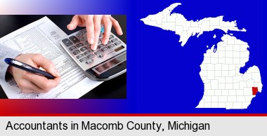 an accountant at work; Macomb County highlighted in red on a map