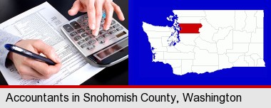 an accountant at work; Snohomish County highlighted in red on a map