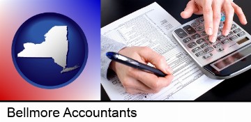 an accountant at work in Bellmore, NY