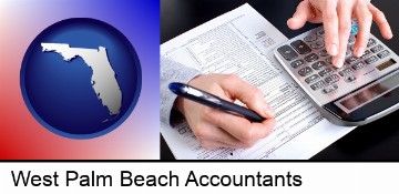 an accountant at work in West Palm Beach, FL